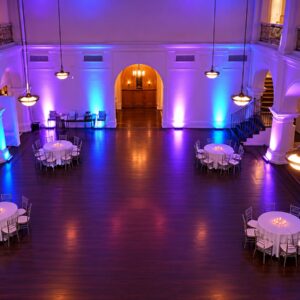 Led Uplighting Formal Event Hall | Osmic Productions Blue and Purple Led Uplighting Illuminating the Walls and Columns of a Formal Event Hall