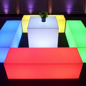 Illuminated rectangular LED bench seating with matching glow furniture