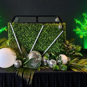 Greenery Dj Booth Façade Hire | Osmic Productions Greenery Dj Facade in an Osmic Styled Display with Separately Quoted Lights and Decorative Props