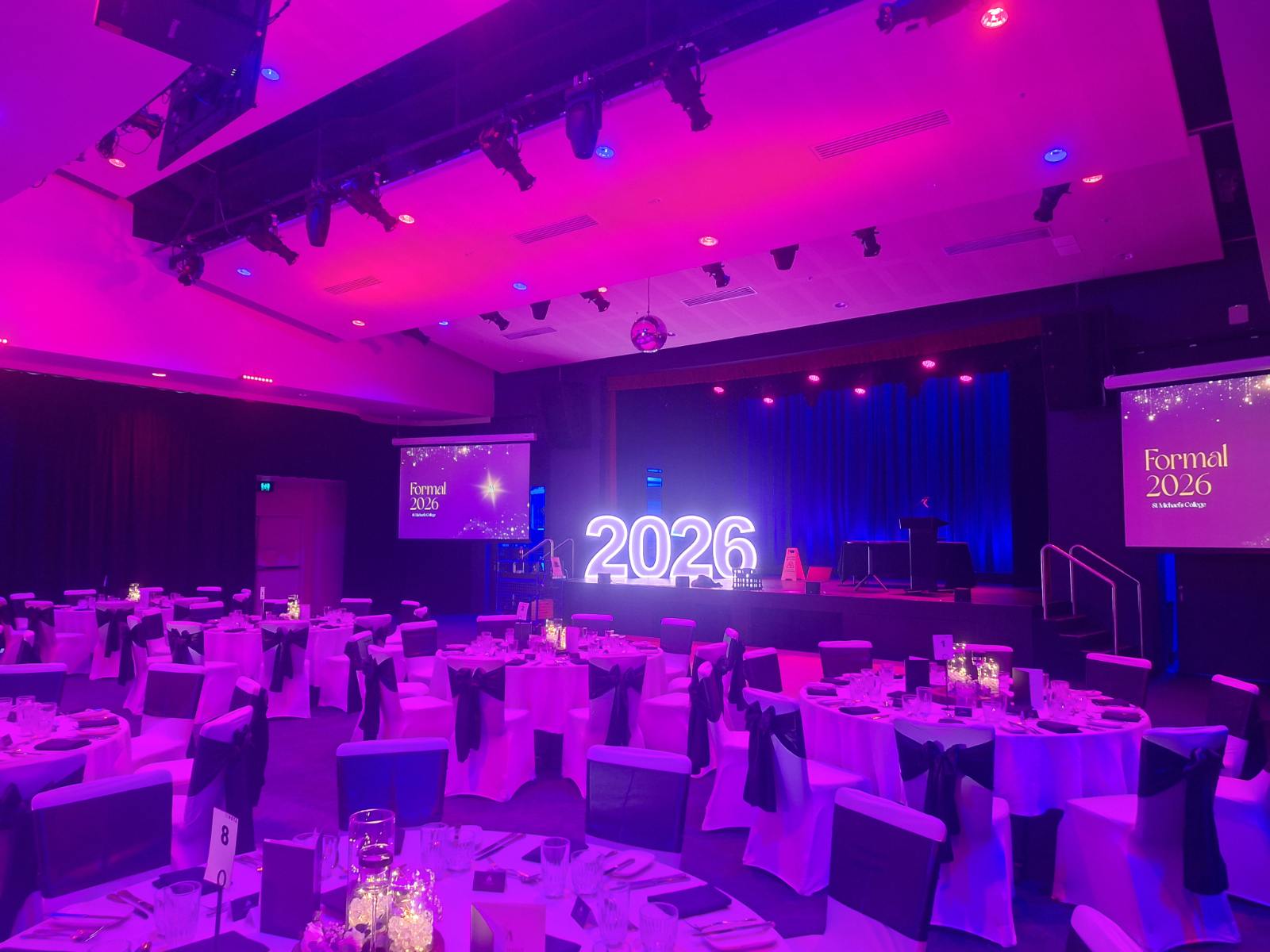 St Michael’s school formal at HOTA with purple lighting and dressed tables