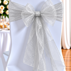 Chair Covered in Pale Blue Fabric with a Large Silver Bow for a Wedding Reception Backdrop.