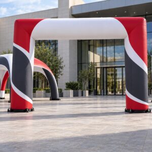 Custom inflatable event range showing an entrance arch, pavilion and advertising columns