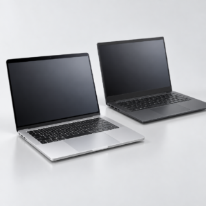 Silver and charcoal laptops illustrating MacBook Pro and Windows event laptop hire
